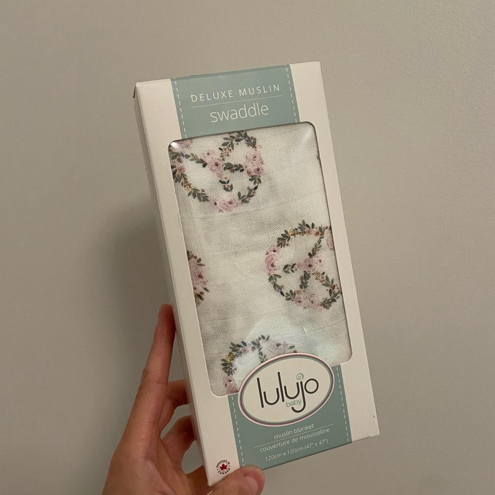 Lulujo peace floral cotton swaddle